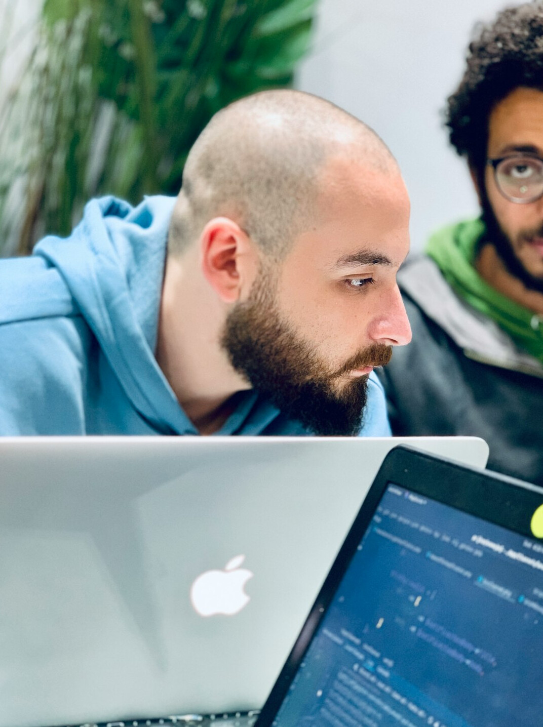 young programmer at laptop